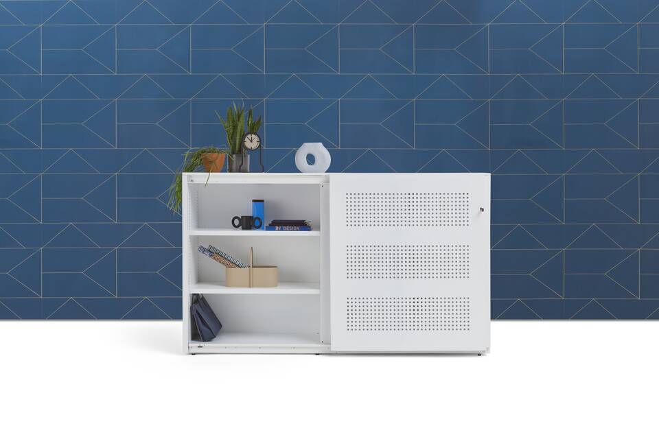 Gispen SDK sliding door cabinet mid in white with square perforation and left door open styled with backpanel front view