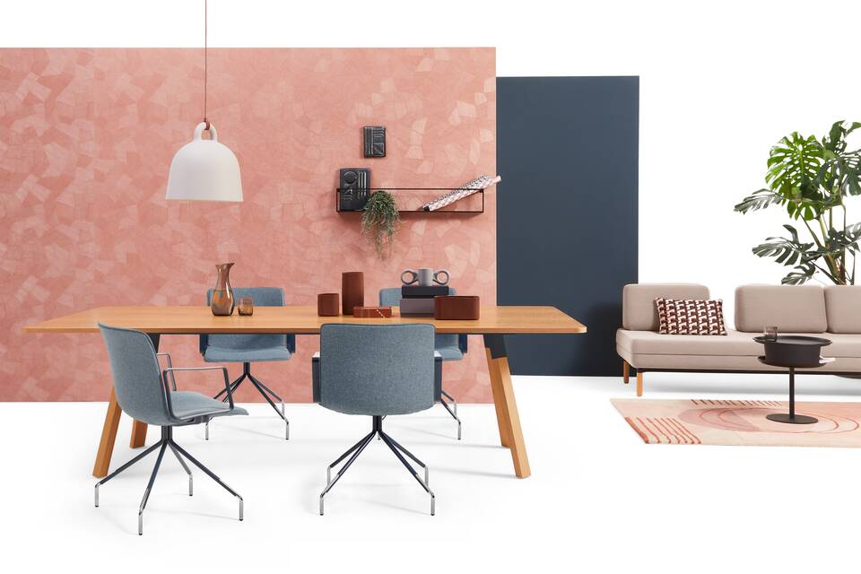 Gispen NOMI Work chair with blue upholstered cover and TEAM Wood rectangle with STEE sofa in hotelification setting front view