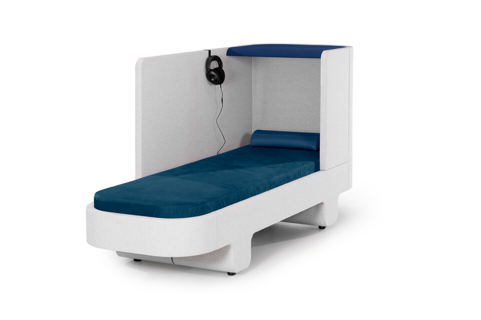 Royal Ahrend Loungescape Powernap bed upholstered in grey with turquoise mattrass and blue roof with wired headphones front left view