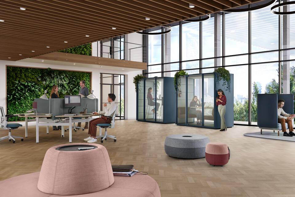 Ahrend Qabin Chat Connect high and Chat Lounge space in space in carbon blue with models and 3 Recharge poufs and Modea desks in a vitalising workspace interior view