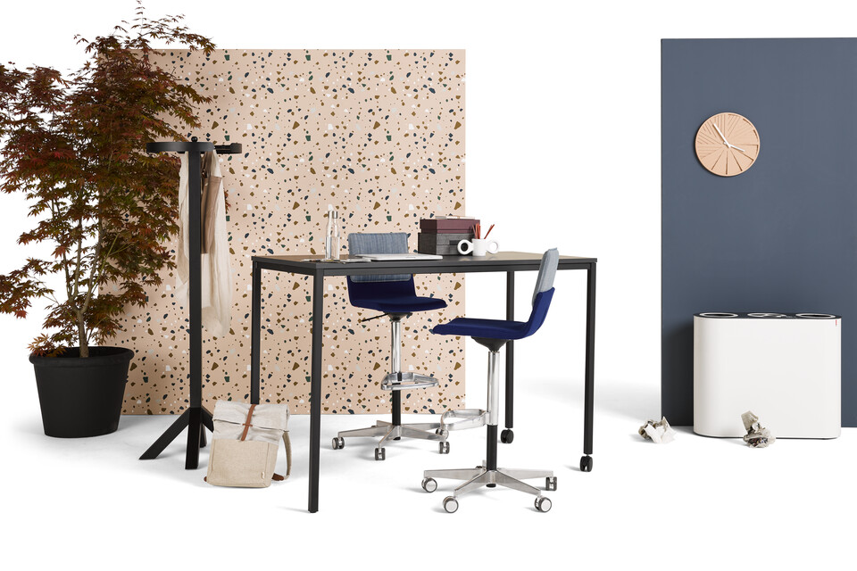 Gispen UT square 4 leg high table in black with black tabletop and castors on one side styled with backpanels front left view