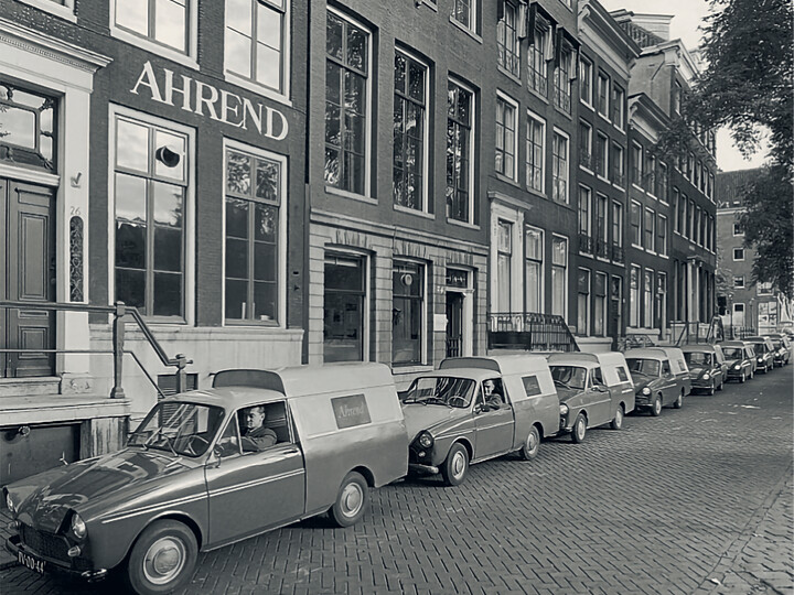 Ahrend buidling in Amsterdam with company cars in front