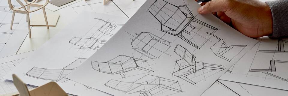 Designer sketching drawing design development product plan draft chair armchair Wingback Interior furniture prototype manufacturing production. designer studio concept
