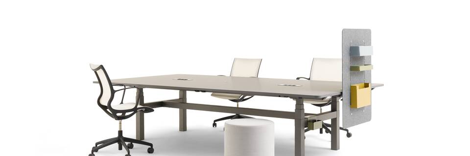 Gispen TMNL Agile table in dark grey with grey tabletop and grey felt sidepanel with Turn chair and grey Asido pouf front right view