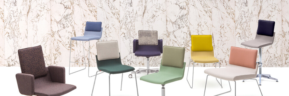 Gispen Triennial chair collection in front of marble backpanel source front view