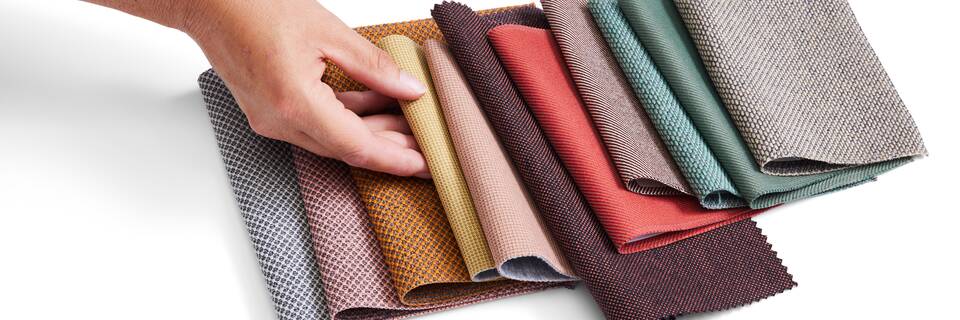 Royal Ahrend sustainable fabric selection with hand front left top view