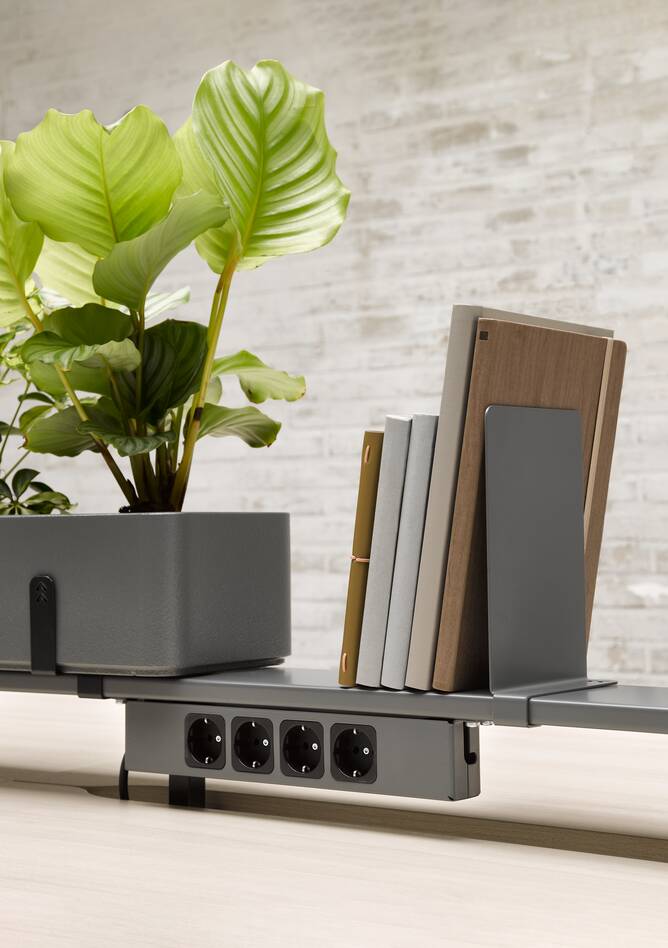 Techo Fount bench in grey and beech top with planter with bookend on accessory rail front right detail view
