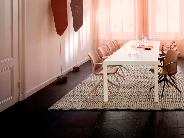 Royal Ahrend Well trestle base chairs fully upholsterered in pink and grey at Kvadrat store in Amsterdam DSF3197