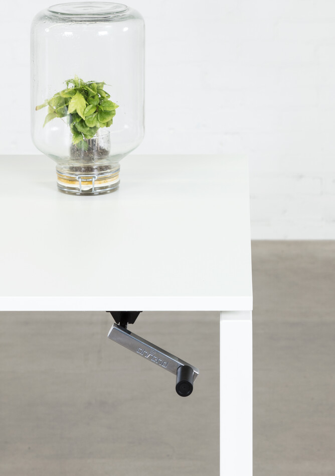 Balance Royal Ahrend Balance 4 leg in white with crank and glass jar with plant front detail view