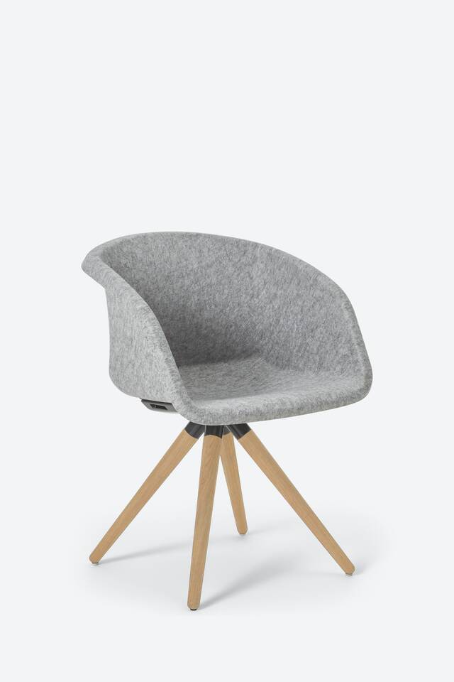 Ahrend Well Armchair on grey background front left view