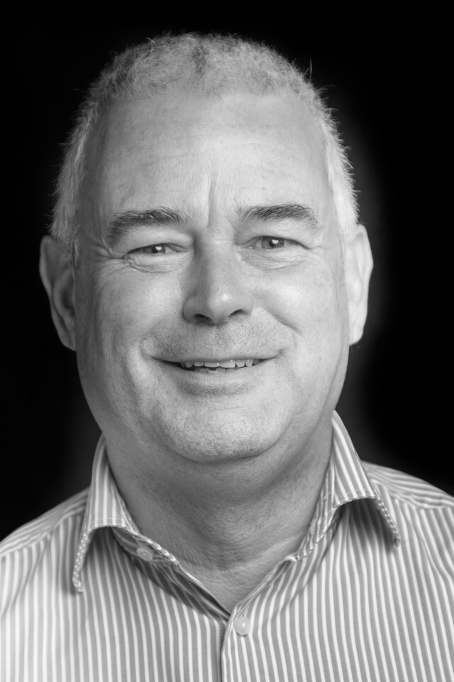 Black and white portrait of Rob Stover