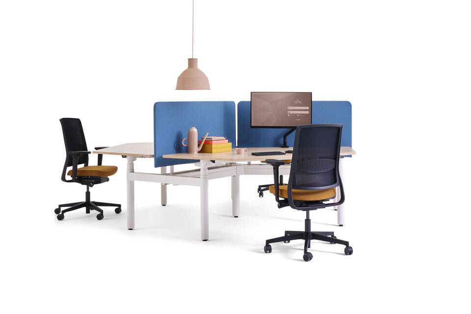Gispen TMNL Round sit stand trio workstation in white with oak tabletop and blue S25 screens styled with ZINN office chairs front left view