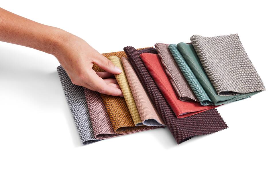 Royal Ahrend sustainable fabric selection with hand front left top view
