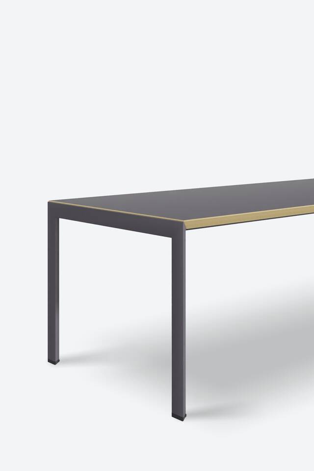 Ahrend Delta table on grey background front left detail view