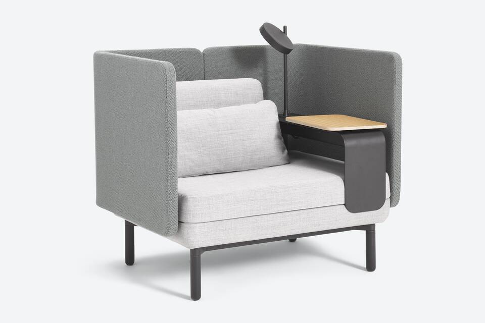 Ahrend Charge lounge chair on grey background front left view