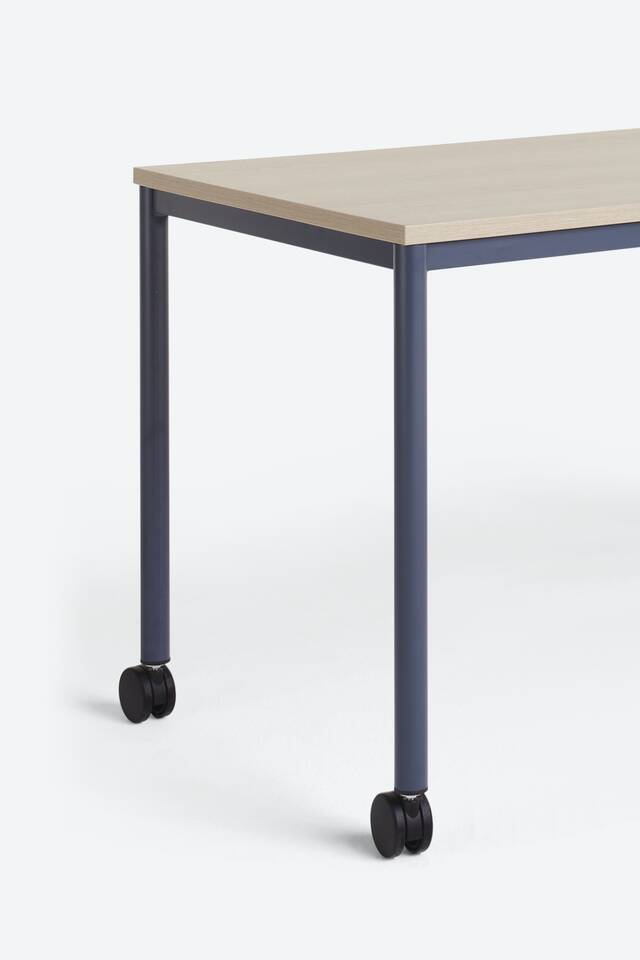 Ahrend 314 table on grey background front left detail view